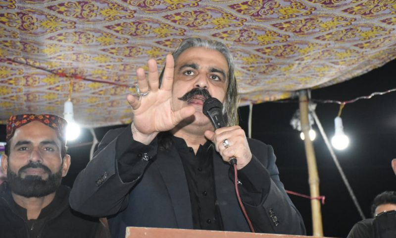 Federal Minister for Kashmir Affairs and Gilgit-Baltistan Ali Amin Khan Gandapur addresses a rally on Monday. — PTI KP Twitter