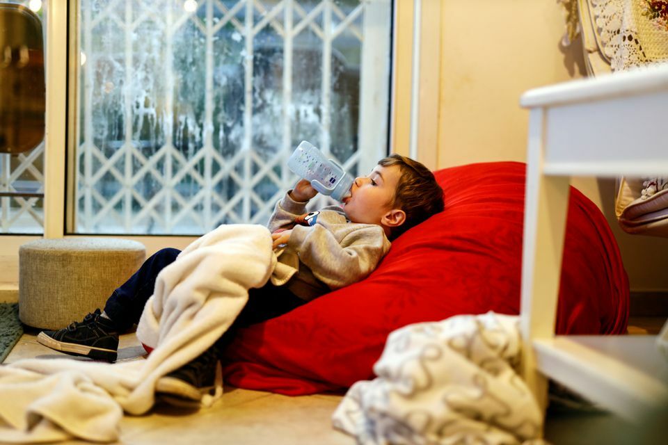 A three-year-old Israeli boy who suffered from Paediatric Multisystem Inflammatory Syndrome, a rare consequence of the coronavirus, drinks from a bottle in his family home, in Tzur Hadassah, Israel, December 5. — Reuters
