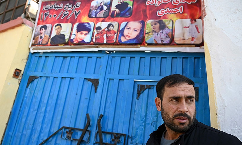 KABUL: Aimal Ahmadi, whose daughter Mailka and elder brother Zimarai Ahmadi were among 10 relatives killed in a US drone strike on August 29, stands outside his home on Tuesday. — AFP