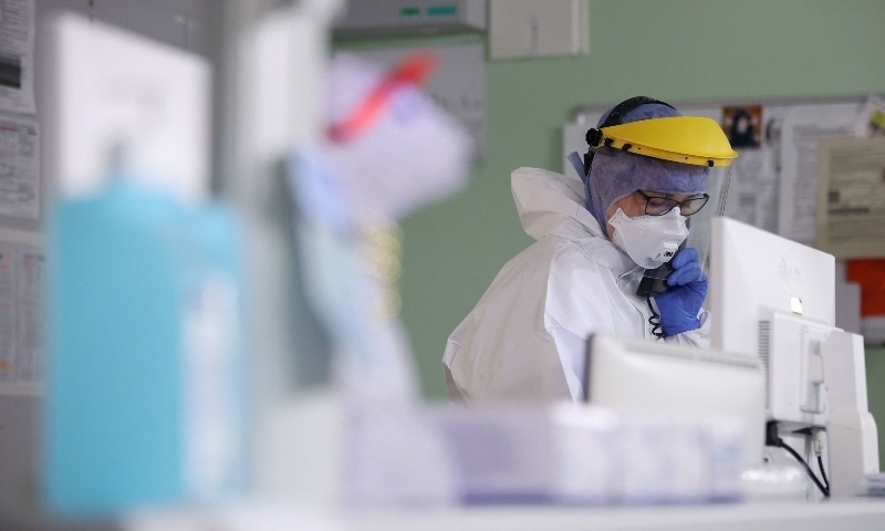 Medical staff monitors patients in the Covid-19 intensive care unit of the University Medical Centre Magdeburg in eastern Germany on December 10. &mdash; AFP