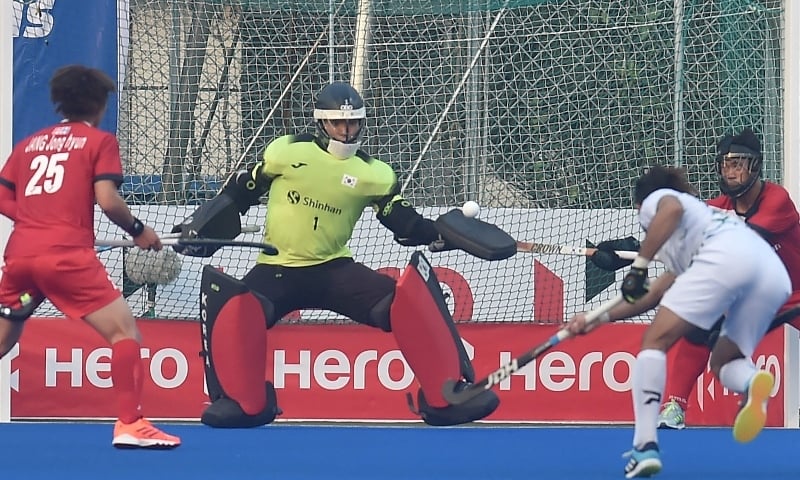 South Korean goalkeeper Kim Jaehyeon blocks a shot on goal by a Pakistan player during their Asian Champions Trophy semi-final at the Maulana Bhashani National Hockey Stadium in Dhaka, Bangladesh on Tuesday. — AFP