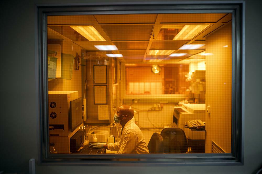 A researcher works on the Omicron variant at the Africa Health Research Institute in Durban, South Africa, Dec 15. &mdash; AP