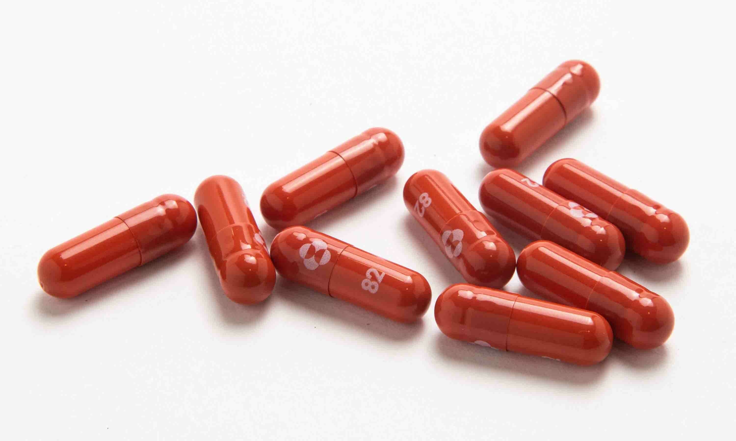 An experimental Covid-19 treatment pill, called molnupiravir, is seen in this undated handout photo released by Merck & Co Inc and obtained by Reuters on October 26. — Reuters