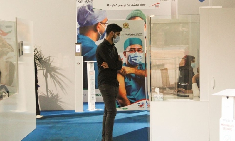 A man waits to receive the vaccine against the coronavirus disease at a vaccination center in Sale, Morocco October 26. — Reuters