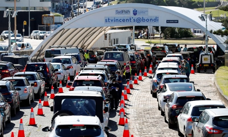 People queue at a coronavirus testing clinic as the Omicron variant of the coronavirus continues to spread in Sydney, Australia, December 30. — Reuters