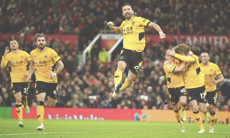 MANCHESTER: Wolverhampton Wanderers’ Joao Moutinho celebrates after scoring during the English Premier League match against Manchester United at Old Trafford.—AP MANCHESTER: Wolverhampton Wanderers’ Joao Moutinho celebrates after scoring during the English Premier League match against Manchester United at Old Trafford.—AP