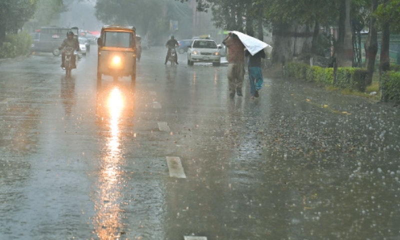 The much-needed rain rids the city of pollutants. — White Star / M. Arif