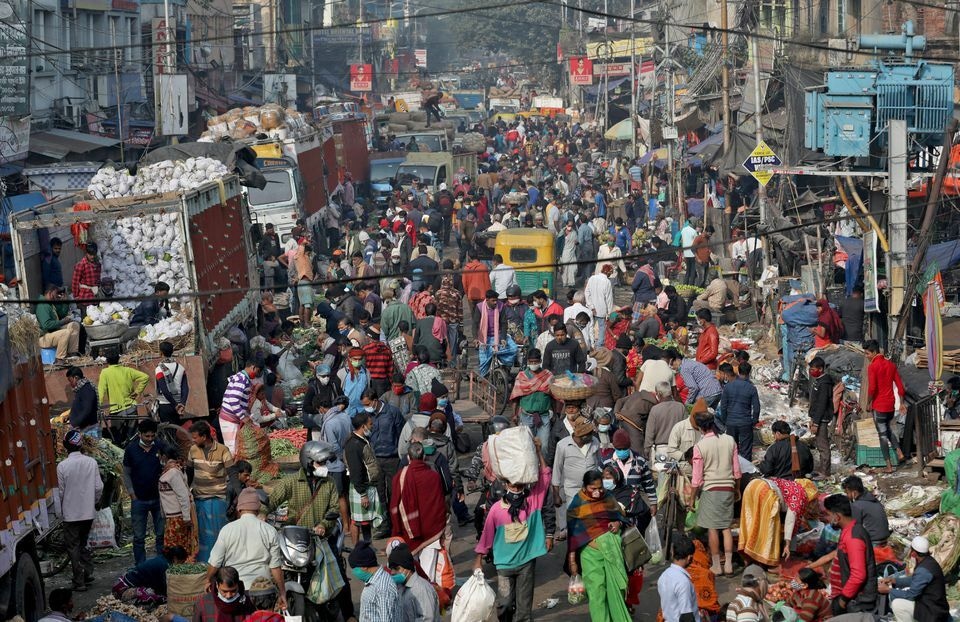 People shop in a crowded market amidst the spread of the coronavirus in Kolkata, India, January 6. — Reuters