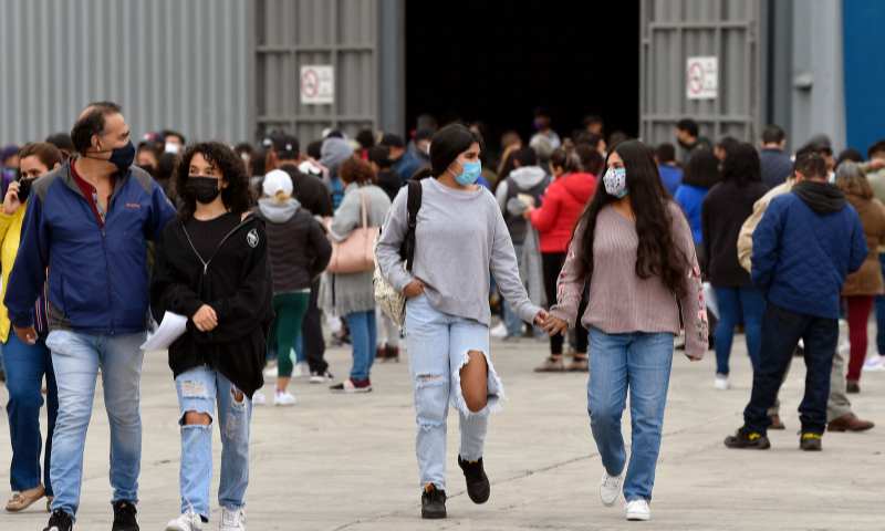People leave after being inoculated with the Pfizer-BioNTech vaccine, as youths aged between 15 and 17 began receiving the first dose, at the Sports Palace in Mexico City, on January 11. &mdash; AFP