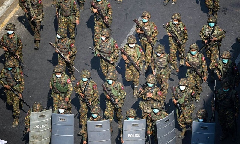 In this file photo, Myanmar soldiers walk along a street during a protest against the military coup in Yangon, Myanmar, Feb 28, 2021. — Reuters