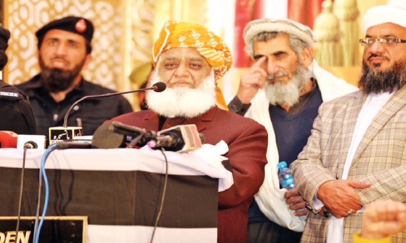 JUI-F chief Maulana Fazlur Rehman addresses workers convention in Mansehra on Saturday. — Dawn JUI-F chief Maulana Fazlur Rehman addresses workers convention in Mansehra on Saturday. — Dawn