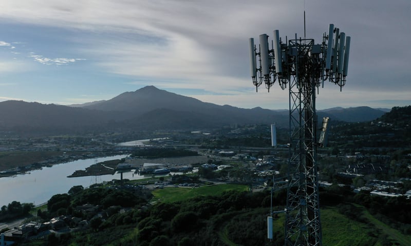 In an aerial view, a cellular tower stands on the top of a hill in California, USA. — AFP