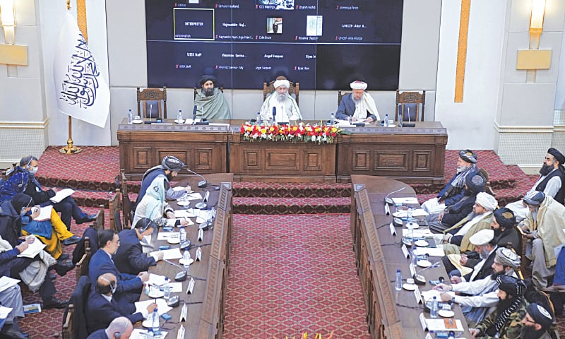 MOHAMMAD Hassan Akhund (centre), the head of the Taliban government, speaks during an economic conference at the former presidential palace in Kabul on Wednesday. Even as Afghanistan’s economy teeters on the brink of collapse, the United Nations representative told the conference that the country had made some progress, including a surprising $1 billion in exports. — AP