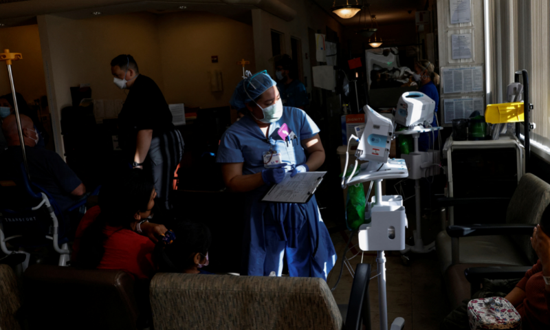 A patient care technician takes vitals of patients in the emergency room waiting area at Providence Mission Hospital in Mission Viejo, California, US. — Reuters