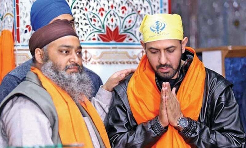 Indian singer and actor Gippy Grewal prays at Gurdwara Punja Sahib in Hassanabdal in this file photo. — Dawn