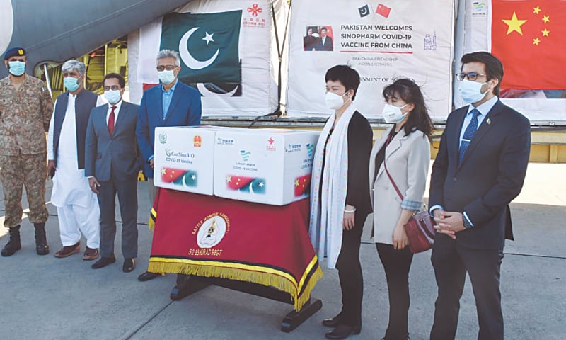 Dr Faisal Sultan receives a consignment of Covid-19 vaccines from China at Nur Khan Airbase | Tanveer Shahzad/White Star