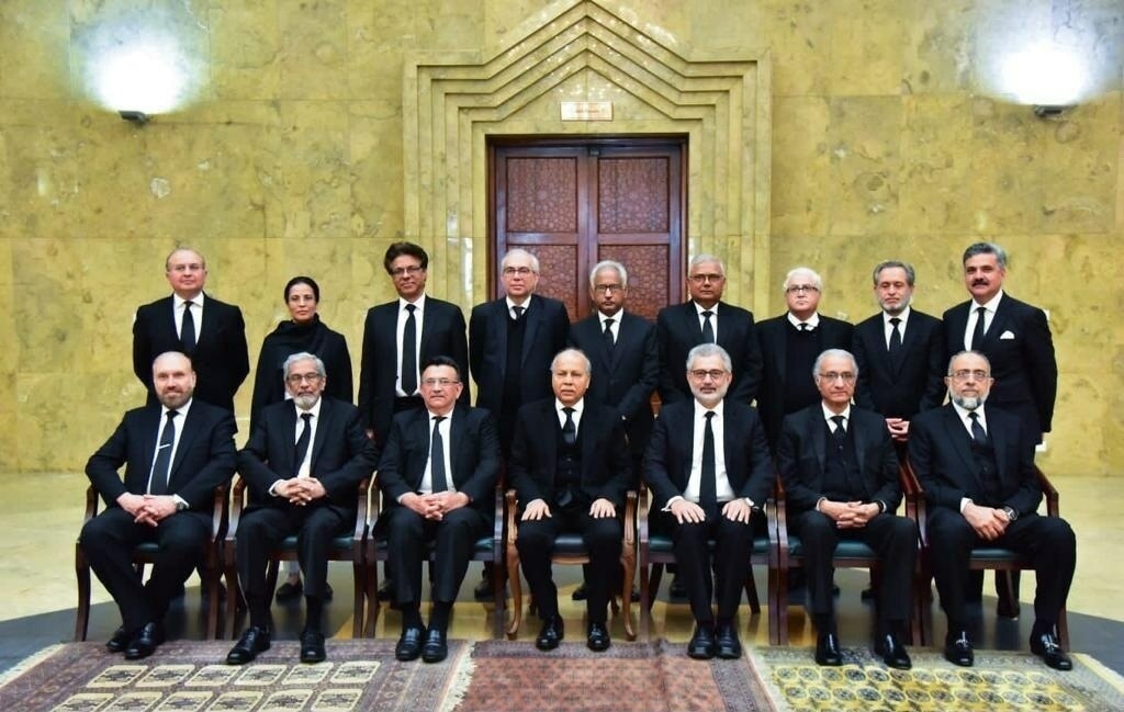 Outgoing Chief Justice of Pakistan Gulzar Ahmed (C) is pictured with the Supreme Court judges on the eve of his retirement. — Photo via author