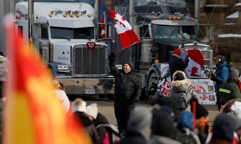 Truckers and supporters continue to protest vaccine mandates in front of Parliament Hill in Ottawa, Ontario. &mdash; Reuters