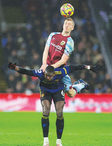 BURNLEY: Burnley&rsquo;s Ben Mee (top) battles for the ball with Manchester United&rsquo;s Paul Pogba during their Premier League match at Turf Moor.&mdash;Reuters