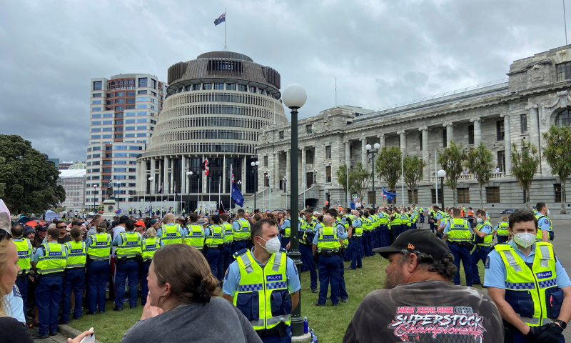 Anti-vaccine mandate protesters gather to demonstrate in front of the parliament in Wellington, New Zealand on Thursday. — Reuters