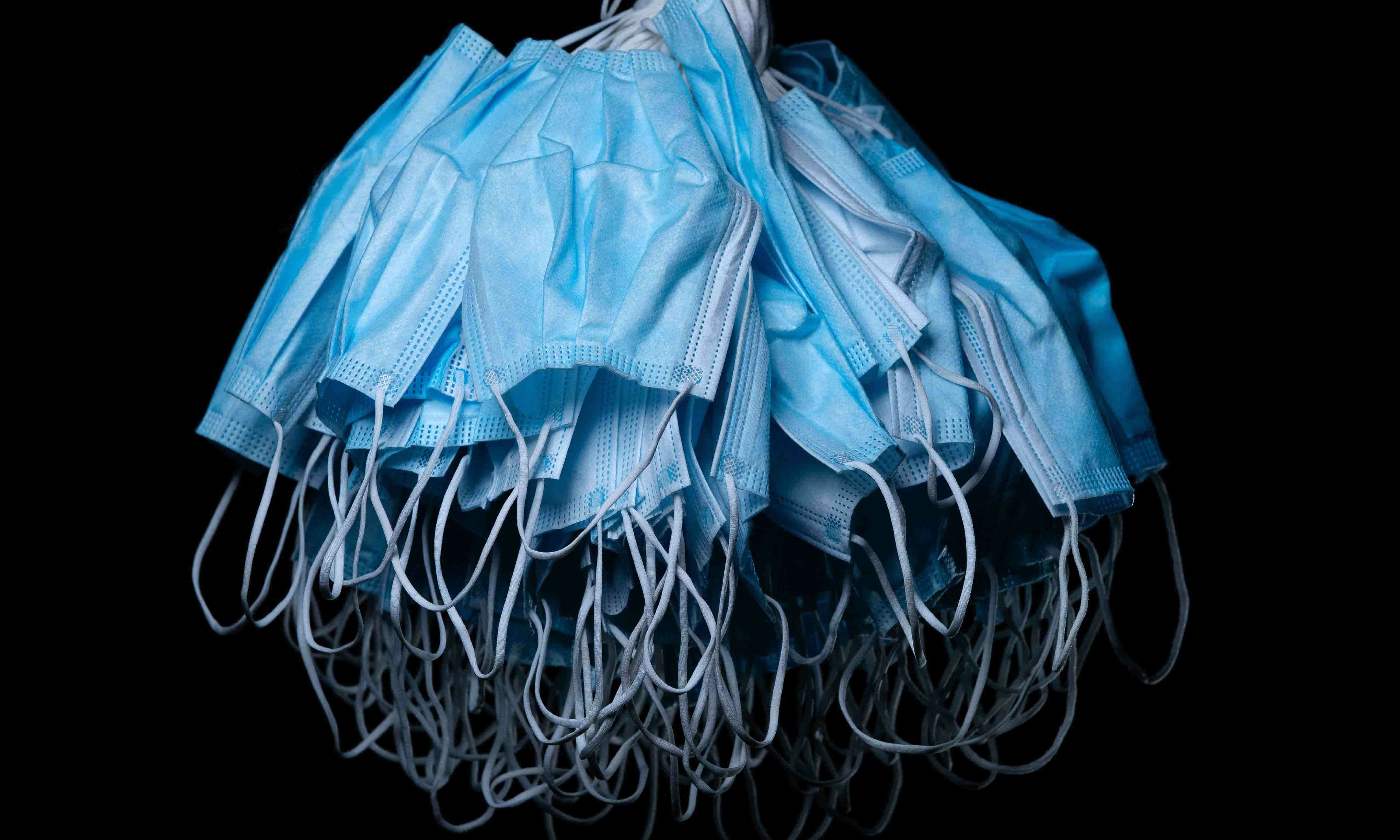 This file photo taken on May 5, 2021 in Paris shows an illustration picture of used protective face masks. &mdash; AFP