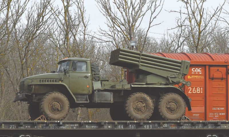 A RUSSIAN military vehicle is seen loaded on a train platform some 50km from the border with the self-proclaimed ‘Donetsk People’s Republic’.—AFP