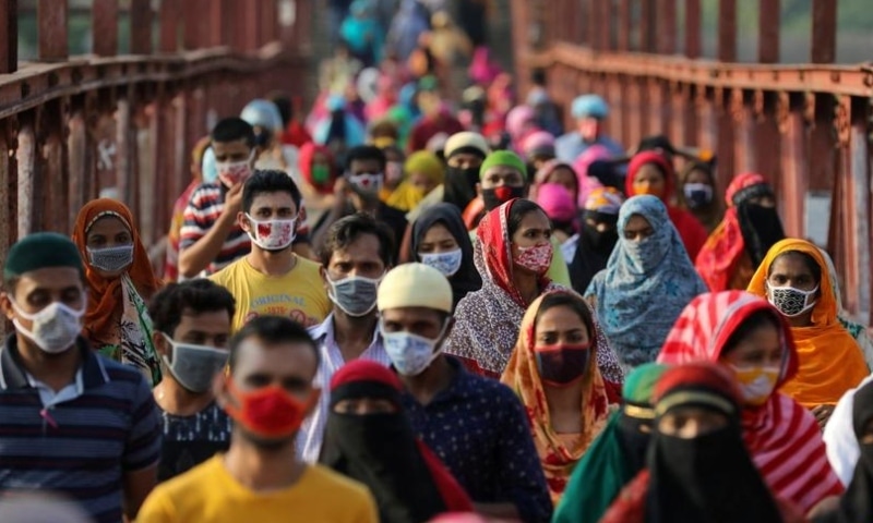 Garment workers return from a workplace as factories reopened after the government has eased the restrictions amid concerns over the Covid-19 outbreak in Dhaka, Bangladesh on May 4, 2020. &mdash; Reuters