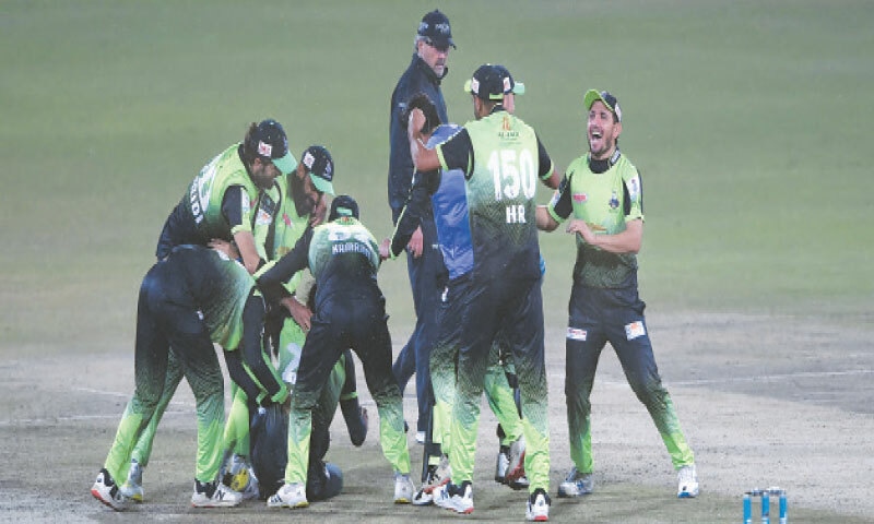 LAHORE Qalandars players celebrate their victory against Islamabad United in Eliminator 2 of the HBL Pakistan Super League at the Gaddafi Stadium on Friday.—AFP