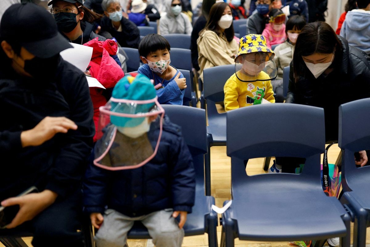 Children rest at a community vaccination centre in Hong Kong, China, February 25. &mdash; Reuters