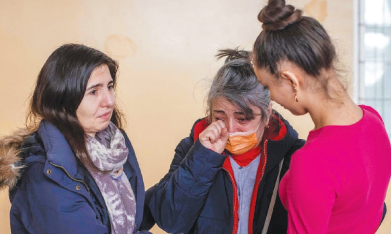 Przemysl, eastern Poland: Nona from Donetsk cries at a temporary accomodation point for Ukrainian refugees in a primary school on Friday.