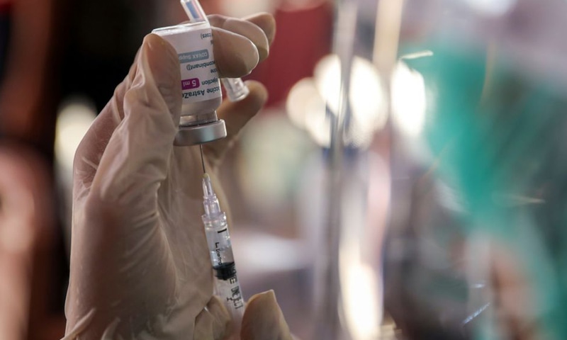 In this file photo, a healthcare worker prepares a dose of AstraZeneca's Covid-19 vaccine during a mass vaccination programme for Green Zone Tourism in Bali, Indonesia. &mdash; Reuters/File