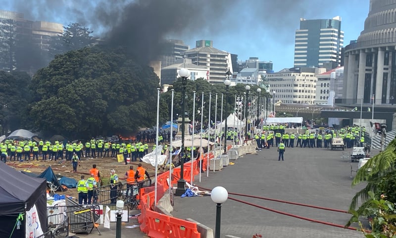 Anti-vaccine mandate protesters clash with police in front of parliament in Wellington, New Zealand. — Reuters