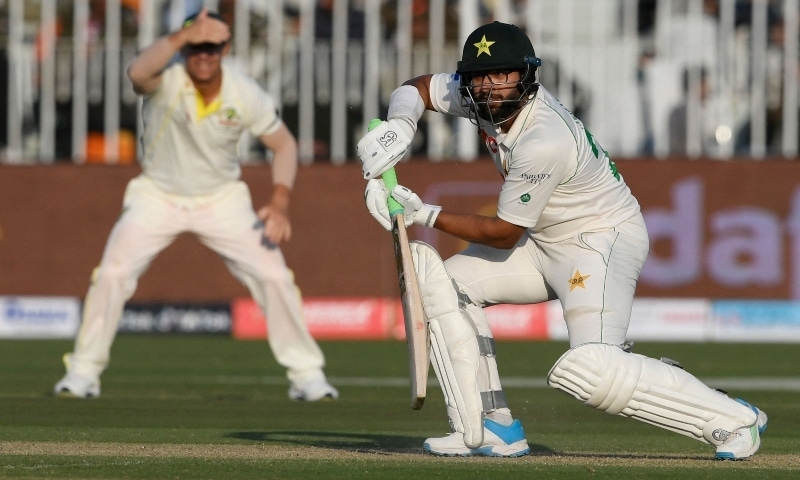 Pakistan's Imamul Haq (R) plays a shot during the first day of the first Test cricket match between Pakistan and Australia at the Pindi Cricket Stadium in Rawalpindi on March 4. — AFP