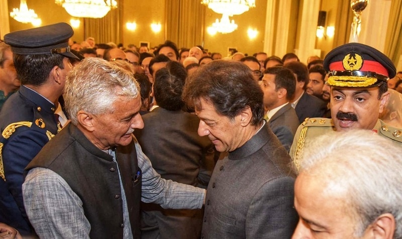 In this file photo of Aug 2018, Khawaja Farooq Ahmed greets Prime Minister Imran Khan at his swearing in ceremony in Islamabad. &mdash;Photo provided by author