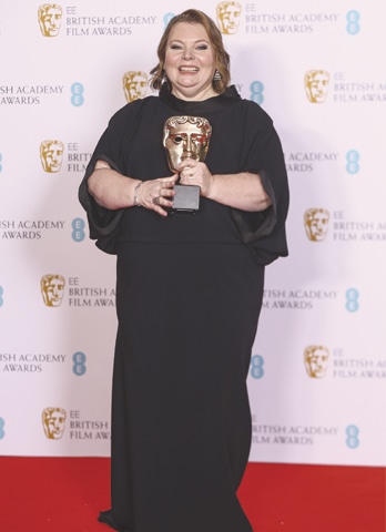 Joanna Scanlan holds the Best Actress award for her role in After Love.&mdash;AP
