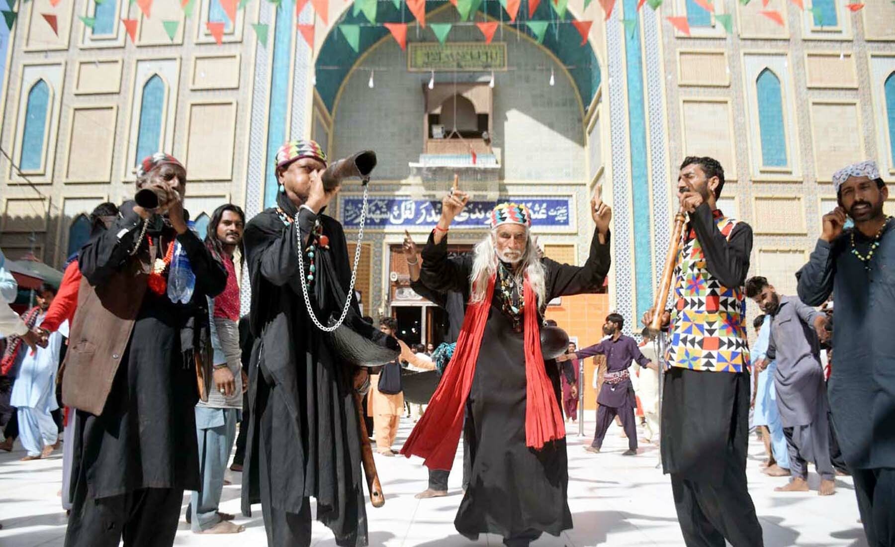 Devotees participate in celebration at Sufi saint Lal Shahbaz Qalandar's urs in Sehwan.