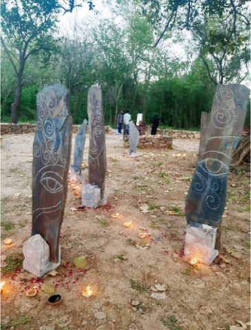 Some of the slab engravings with images of women, flower patterns and calligraphy displayed at F-9 Park. — White Star