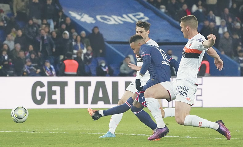 PARIS: Paris St Germain’s Neymar shoots to score during the Ligue 1 match against Lorient at the Parc des Princes.—AP PARIS: Paris St Germain’s Neymar shoots to score during the Ligue 1 match against Lorient at the Parc des Princes.—AP
