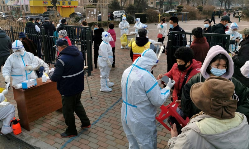 Residents line up at a Covid testing site in the Liaoning province in China.—Reuters