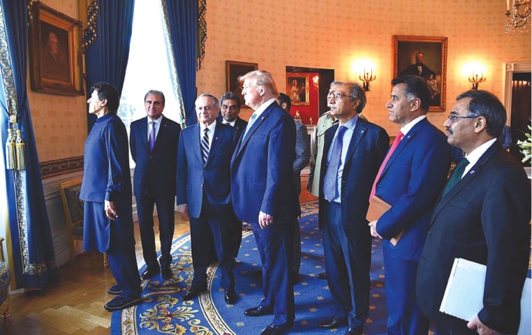 A July 2019 photo shows Imran Khan and the Pakistani delegation with President Donald Trump at the White House | APP