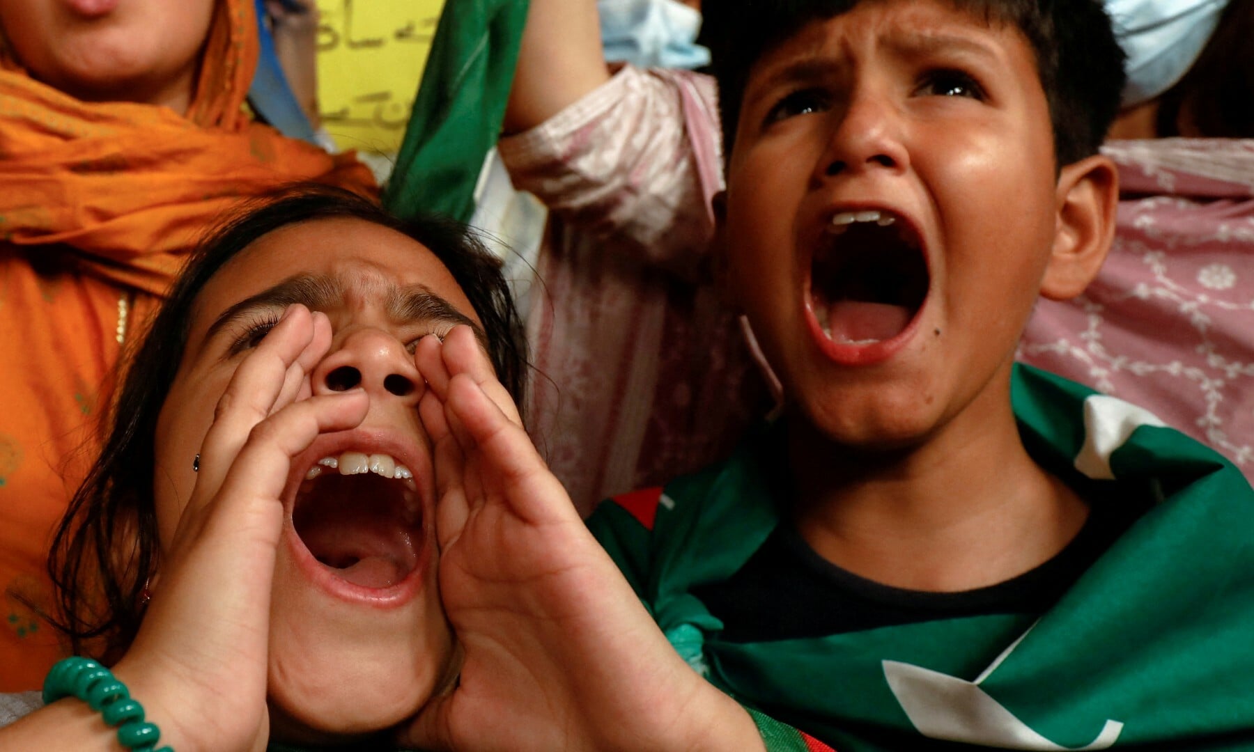 Children chant during a rally in support of former prime minister Imran Khan in Islamabad on April 10. — Reuters