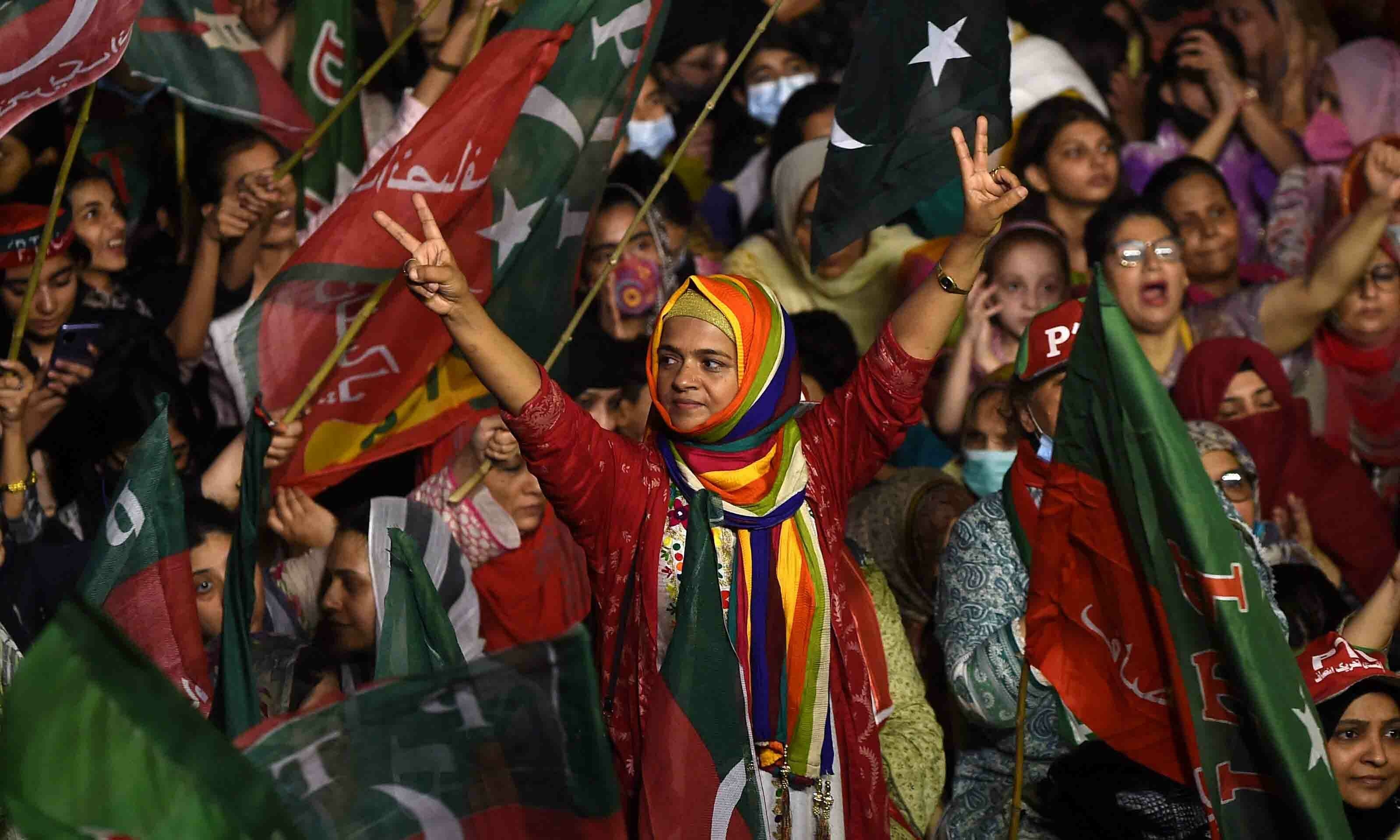 PTI supporters take part in a rally in support of former prime minister Imran Khan in Karachi on April 10. — AFP