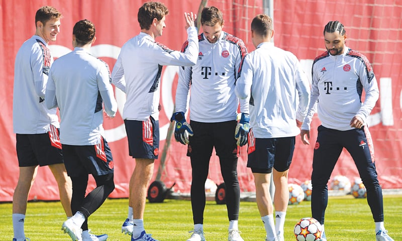 MUNICH: Bayern Munich players attend a training session on Monday.&mdash;AFP