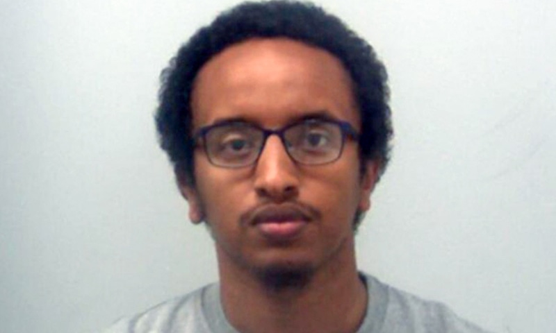 An undated handout picture released by the Metropolitan Police Service on April 13, 2022, shows a custody photograph of Ali Harbi Ali. &mdash; AFP