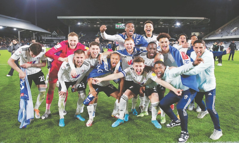 LONDON: Fulham players celebrate their promotion to the Premier League after the Championship match against Preston North End at Craven Cottage.&mdash;Reuters
