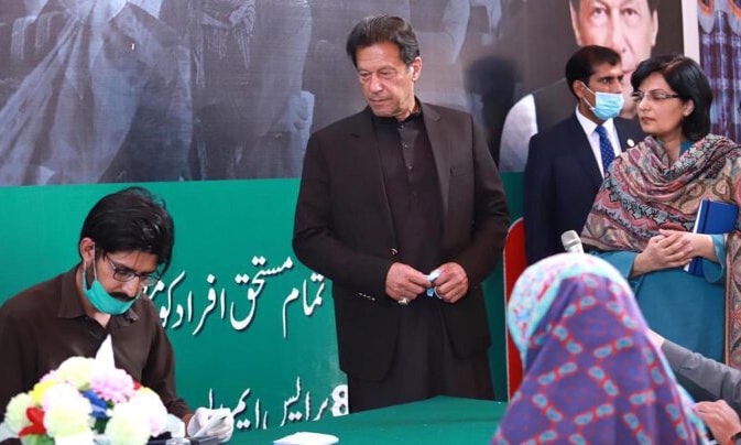 Former prime minister Imran Khan visits an Ehsaas cash distribution point on April 23, 2020. — INP