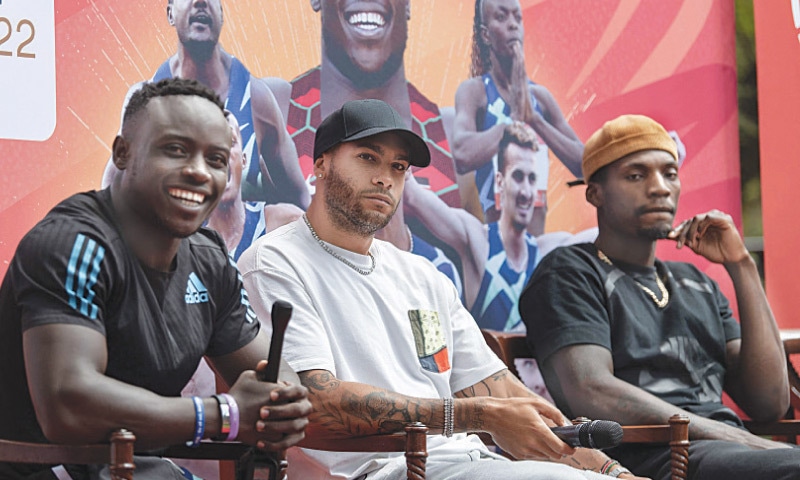 ITALY’S Lamont Marcell Jacobs (C) attends a press conference alongside Fredrick Lee Kerley (R) of the US and Kenya’s Ferdinand Omanyala on Friday.—AFP ITALY’S Lamont Marcell Jacobs (C) attends a press conference alongside Fredrick Lee Kerley (R) of the US and Kenya’s Ferdinand Omanyala on Friday.—AFP