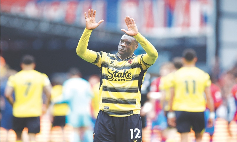 LONDON: Watford’s Ken Sema gestures to fans after the team’s relegation from the Premier League was confirmed after their loss to Crystal Palace at Selhurst Park on Saturday.—Reuters