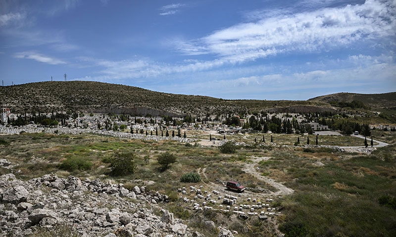 This general view taken on May 10, in Schisto, on the western outskirts of Athens, shows an area in which is expected to be created a Muslim cemetery next to the Orthodox cemetery. — AFP