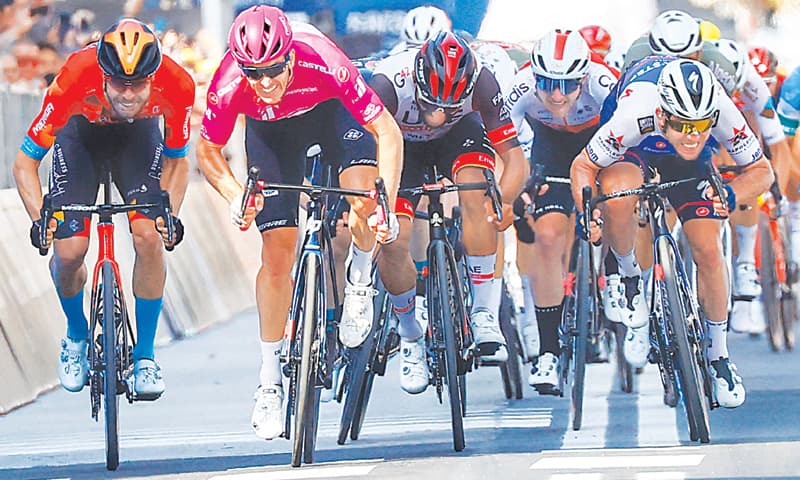 TEAM Groupama-FDJ’s Arnaud Demare (second L) of France sprints to cross the finish line to win ahead of Team Bahrain’s German rider Phil Bauhaus (L), Team Quick-Step Alpha Vinyl’s Mark Cavendish (R) of Britain and Team UAE Emirates’ Colombian rider Fernando Gaviria (C) during the 13th stage of the Giro d’Italia, a 150km distance from San Remo to Cuneo, on Friday.—AFP